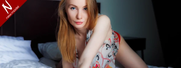 Vi Ezra sexy girl on the bed with pretty smile